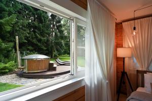 Romantic cozy house Kirzacinas pirts with sauna close to seaside