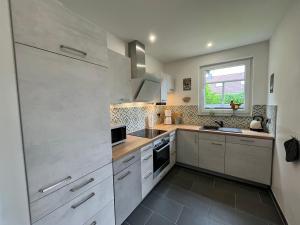 Ferienhaus "De lütten Tieden" 65358