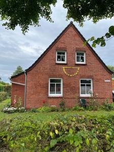 Ferienhaus "De lütten Tieden" 65358