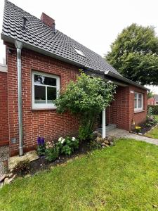 Ferienhaus "De lütten Tieden" 65358