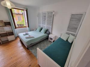 B&B / Chambres d'hotes L-Embellie : photos des chambres