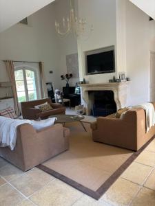 Villas Magnifique villa avec piscine : photos des chambres