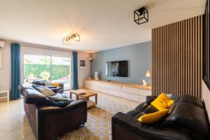Maisons de vacances L’Ame des Vignes - Climatisee avec piscine : photos des chambres