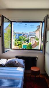 Sejours chez l'habitant Chambre dans appartement agreable et calme a 15 mn du Centre Ville : photos des chambres