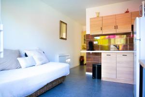 Appartements Studio 2 personnes piscine partagee : photos des chambres