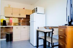 Appartements Studio 2 personnes piscine partagee : photos des chambres