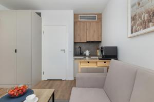 Jantaris Apartments near Beach with Fitness by Noclegi Renters