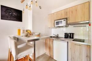 Appartements La Tour - Studio Trocadero : photos des chambres