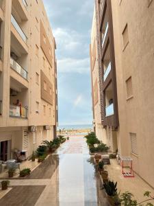 S1 résidence avec piscine et Pied dans leau