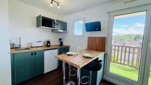 Appartements L-Escapade, studio acces direct a la plage : photos des chambres