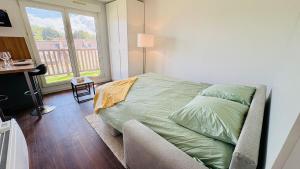 Appartements L-Escapade, studio acces direct a la plage : photos des chambres