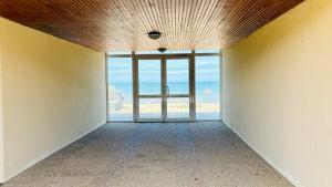 Appartements L-Escapade, studio acces direct a la plage : photos des chambres