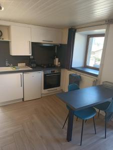 Appartements Studio cosy avec alcove et terrasse : photos des chambres