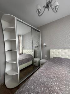 Уютная квартира на Каманина Аркадия