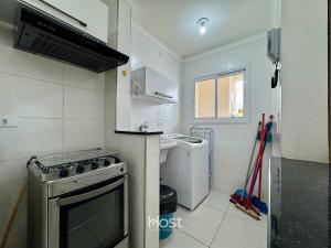 Apto com Churrasqueira e Piscina em região central