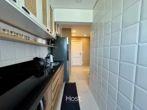 Cobertura com AC e Churrasqueira a 700m da Praia