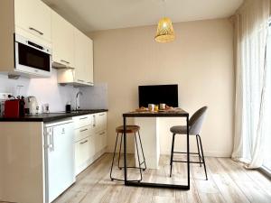 Appartements Fleur de Lys - Elegance & serenite en centre-ville : photos des chambres