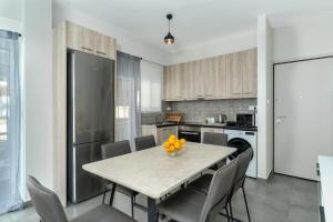 Aera Nest - 2BR, Alimos