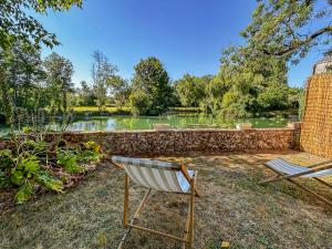 Maisons de vacances Maison cosy avec jardin, riviere et ponton prive : photos des chambres