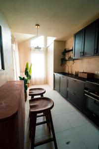 Triplex Design avec Rooftop et Salle Cinéma