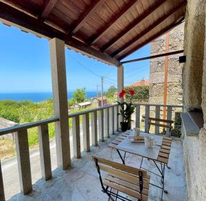 Tiny house with sunset over the ocean