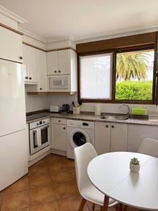 Apartamento con jardin y parking privado