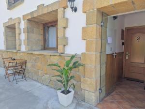 Apartamento con jardin y parking privado