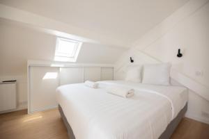 Appartements Eiffel Tower View with AC : photos des chambres