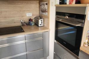 Maisons de vacances Nice house with garden near the beach : photos des chambres