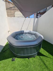 Maisons de vacances Studio avec exterieur prive et jacuzzi : photos des chambres