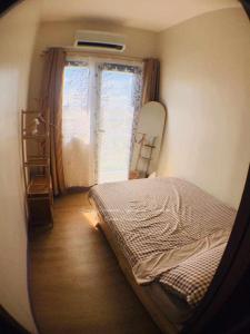 Sky Suites at Spring Residences Condotel near NAIA and SM Bicutan Mall