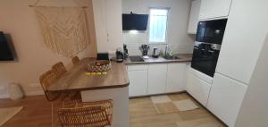 Appartements Le cocon boheme, parking, clim, bureau : photos des chambres
