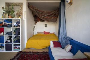 Appartements A cocoon of love bathed in natural light : photos des chambres