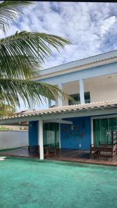 Casa de praia estilo pousada