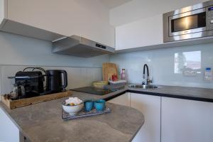 2BR Getaway w Balcony & Fast WiFi, Near Tram
