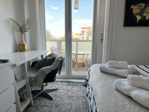 Quarto com casa de banho privativo