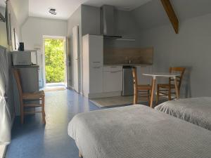 Maisons d'hotes Studio a Vierville-sur- mer(plage du Debarquement) : photos des chambres