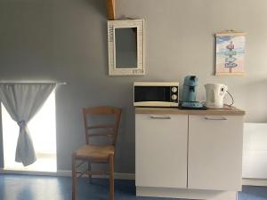 Maisons d'hotes Studio a Vierville-sur- mer(plage du Debarquement) : photos des chambres