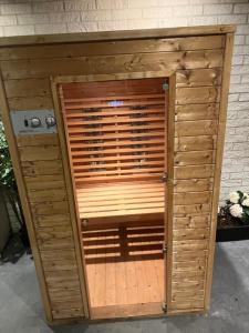 Klassiek veluws huis onder de beuken