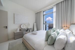 Sky-High 1BR RetreatMarina VistaEmaar Beachfront