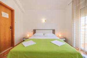 Apartments with parking space Krk - 24809