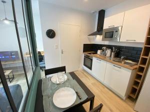 Appartements Logement Neuf Cosy avec Espaces Communs Premium 01 : photos des chambres