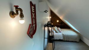 Appartements EnergyZen - gite Alsace - L-Atelier des Songes : photos des chambres