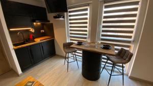 Appartements EnergyZen - gite Alsace - L-Atelier des Songes : photos des chambres