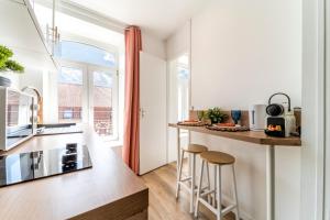 Appartements Le Taiga - Wifi - Parking gratuit - Metro - Gare - Musee Piscine : photos des chambres