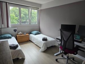 B&B / Chambres d'hotes Chambre d-hotes Paris La defense Arena : photos des chambres