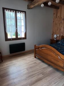 Appartements GITE AUX VIEUX BOIS : photos des chambres