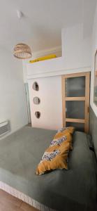 Appartements T2 avec terrasse en rdc de maison de ville : photos des chambres