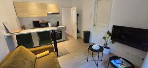 Appartements T2 avec terrasse en rdc de maison de ville : photos des chambres