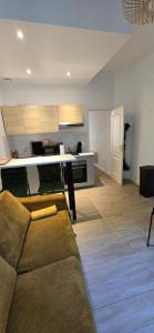 Appartements T2 avec terrasse en rdc de maison de ville : photos des chambres